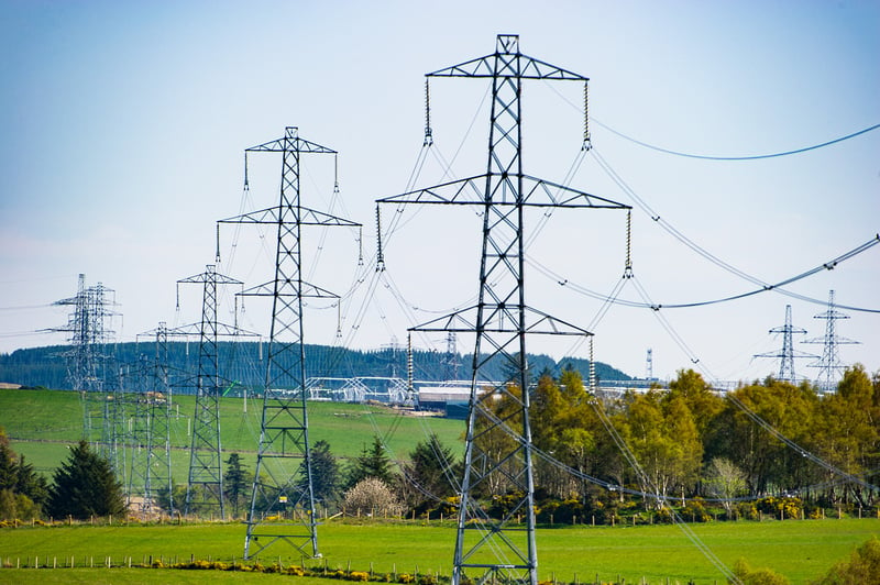 Column of towers in the hills of the countryside