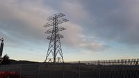 A metal transmission tower, without any lines connected to it.