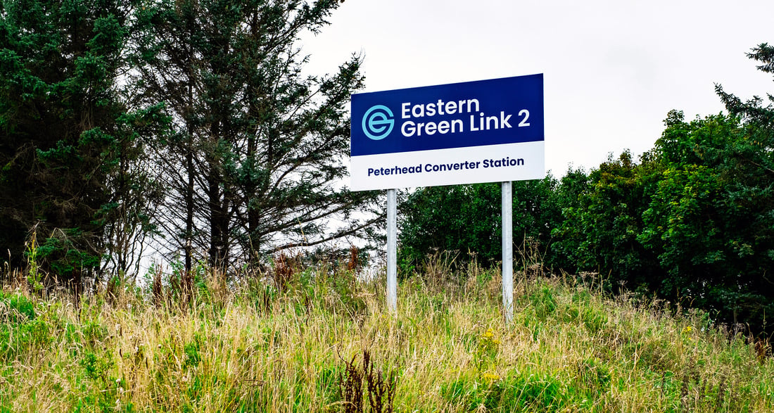 Image of blue and white Eastern Green Link 2 signage  