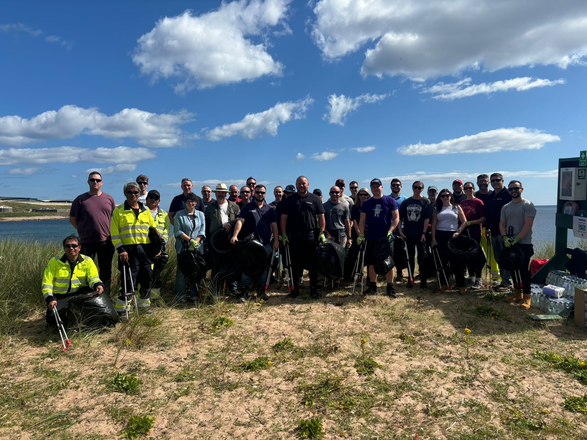 SSEN Transmission_32 volunteers from EGL2 project teams helped clear-up picturesque Sandford Bay.jpg